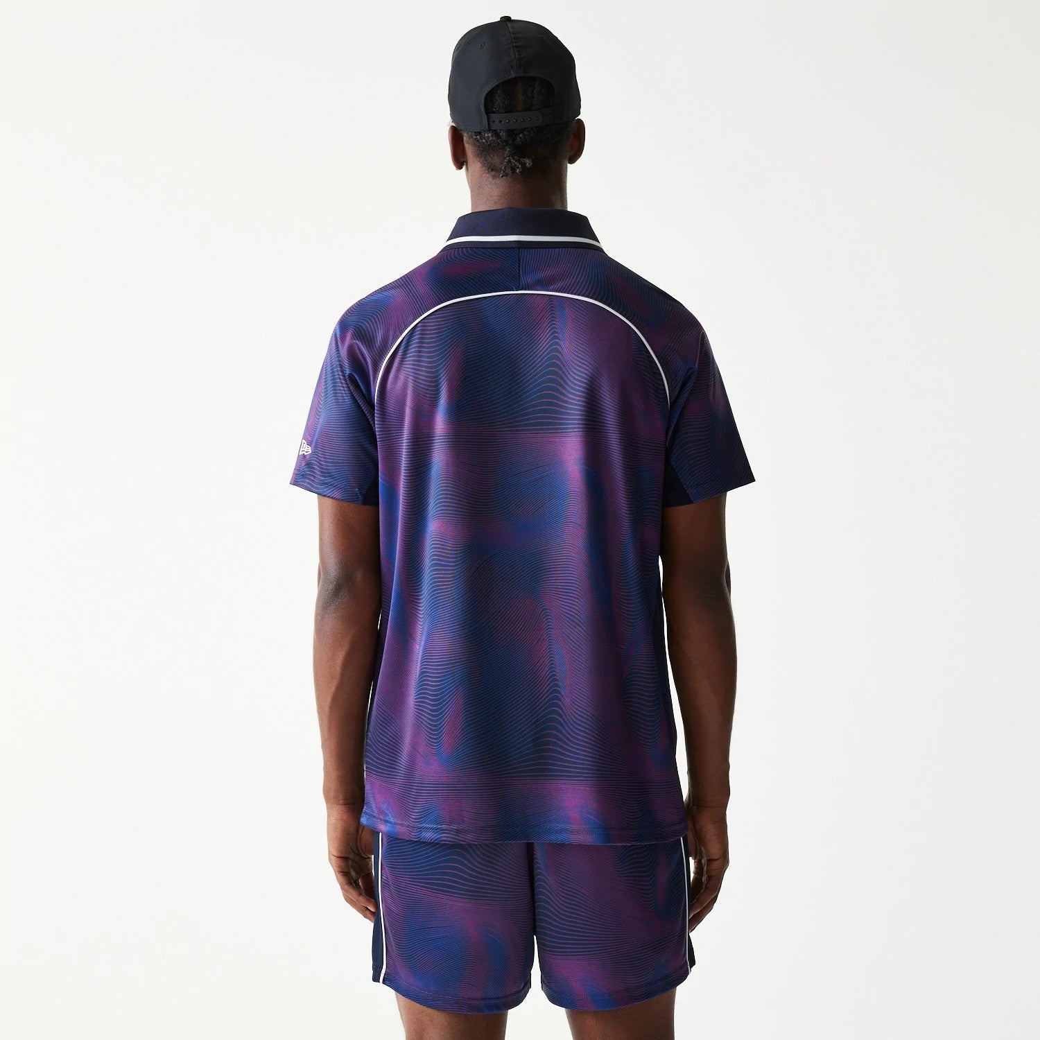 The model is wearing this Red Bull Racing All Over Print Football T-Shirt in dark blue. 2