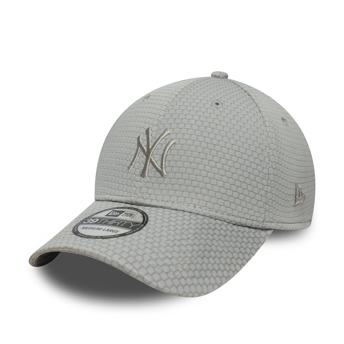 New York Yankees MLB Mesh Grey New Era 39THIRTY Stretch Fit Cap, three-quarter view showing raised grey NY logo embroidery on the front panel, with a grey curved visor and a 39THIRTY size sticker on top, and New Era flag logo on the left side.