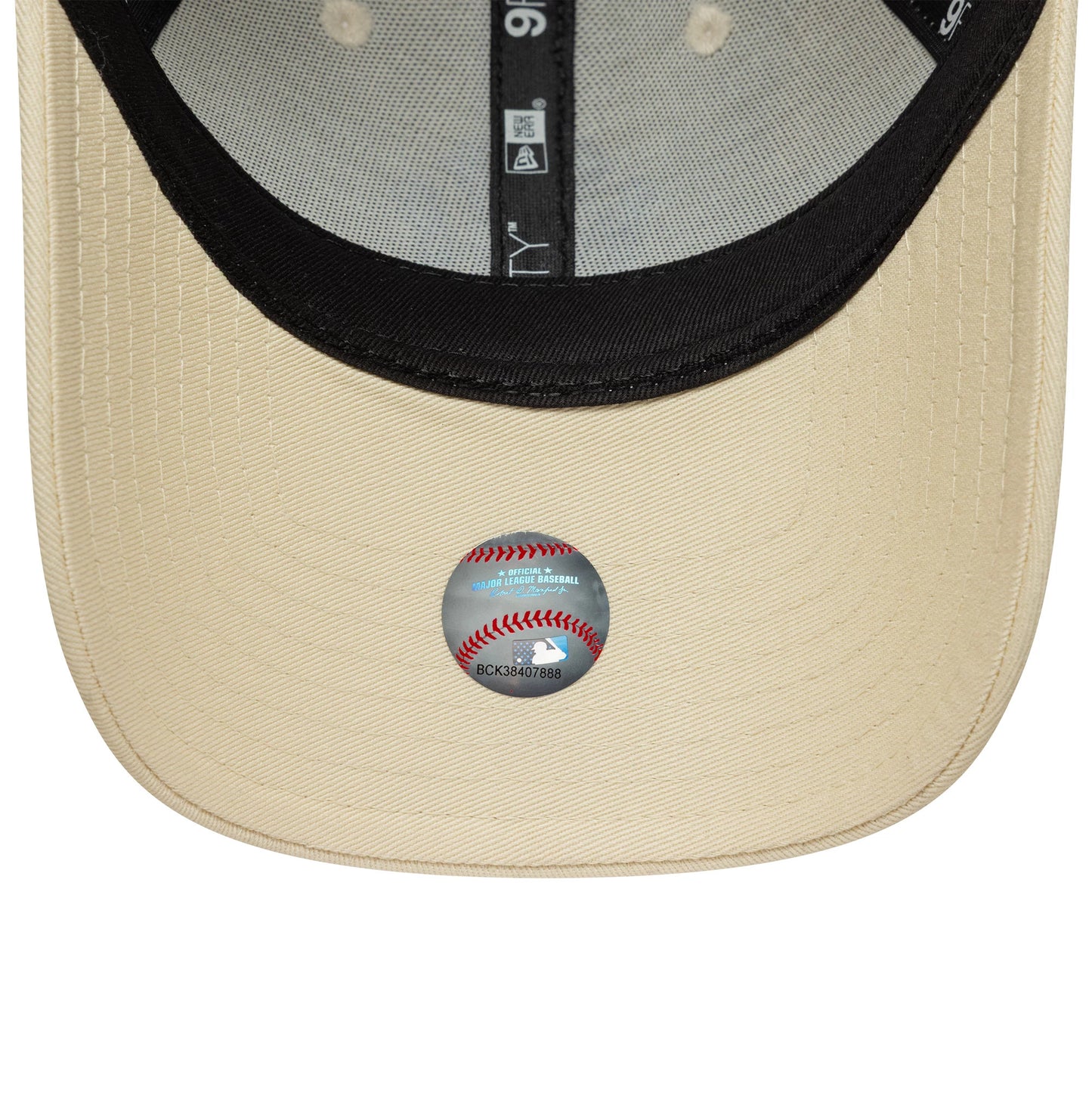 Pictured is this Womens MLB Metallic Logo New York Yankees 9FORTY in light beige. 5