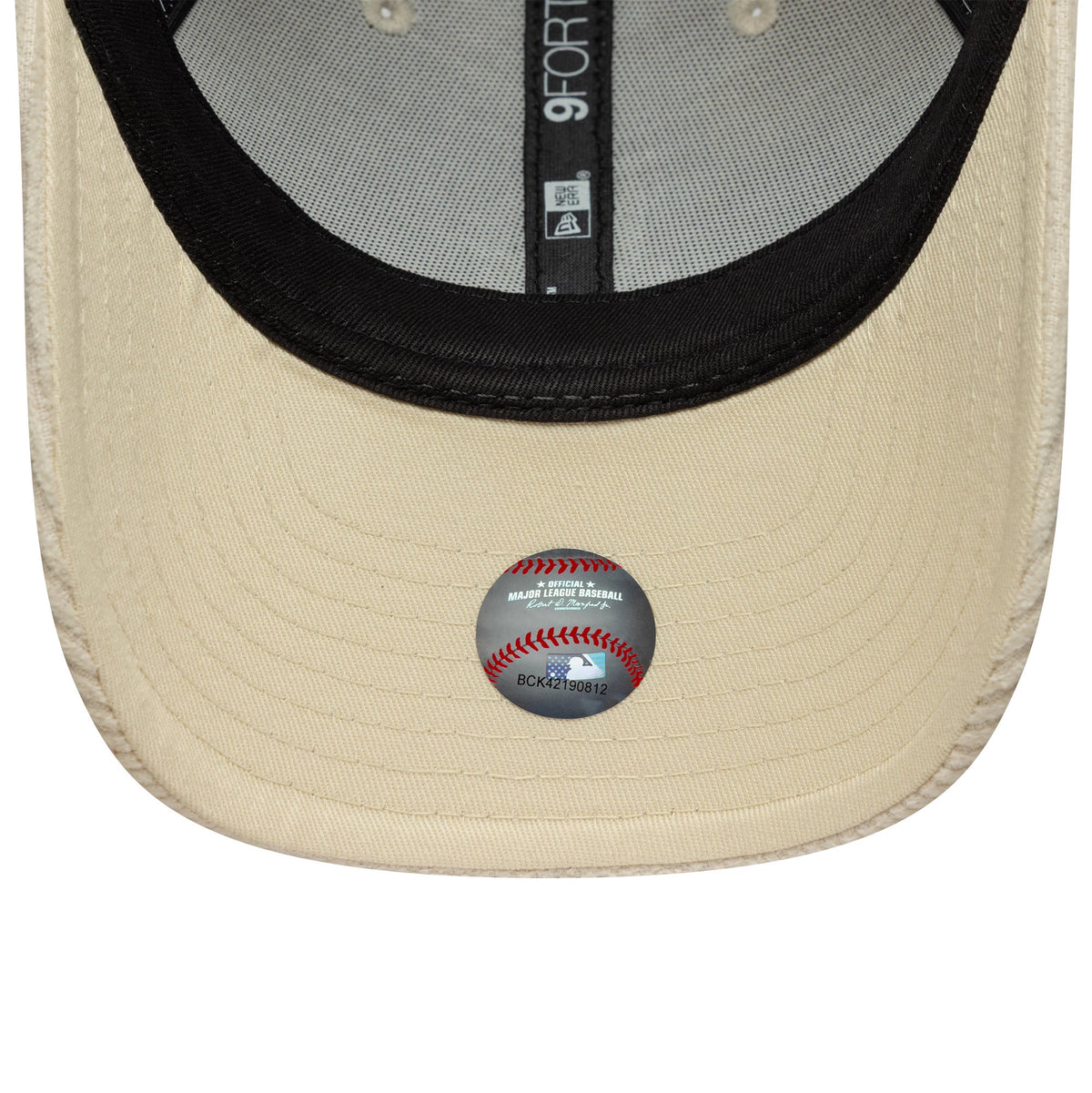 LA Dodgers Womens MLB Pastel Cord Light Beige New Era 9FORTY M-Crown Cap, inside view showing the MLB sticker centred on the light beige undervisor, with black sweatband, grey taping, and rear eyelets.