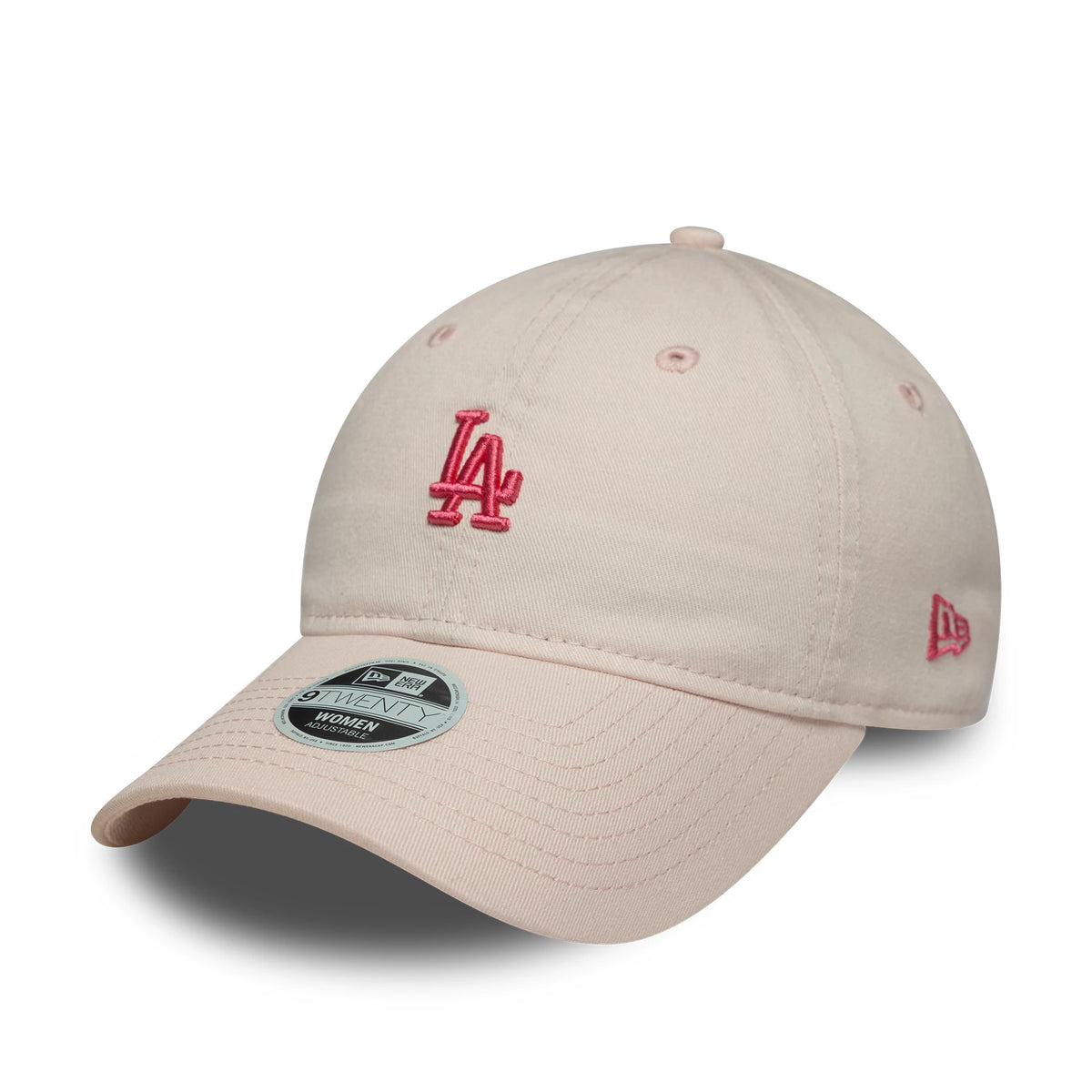 LA Dodgers Womens MLB Washed Mini Pastel Pink New Era 9TWENTY Cap, three-quarter view showing pink embroidered LA logo on the front panel, curved pastel pink visor with 9TWENTY size sticker, and pink New Era flag logo on the left side.