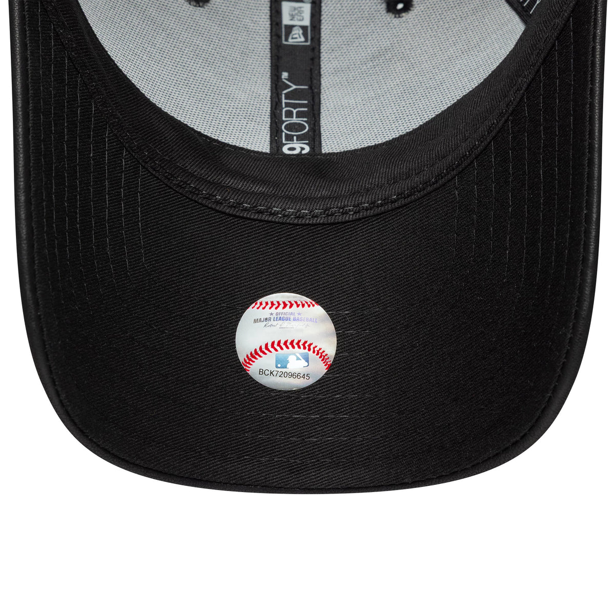New York Yankees Womens MLB PU Black New Era 9FORTY Cap, inside view showing the grey sweatband with black taping and the white MLB sticker with red baseball stitching on the black undervisor.
