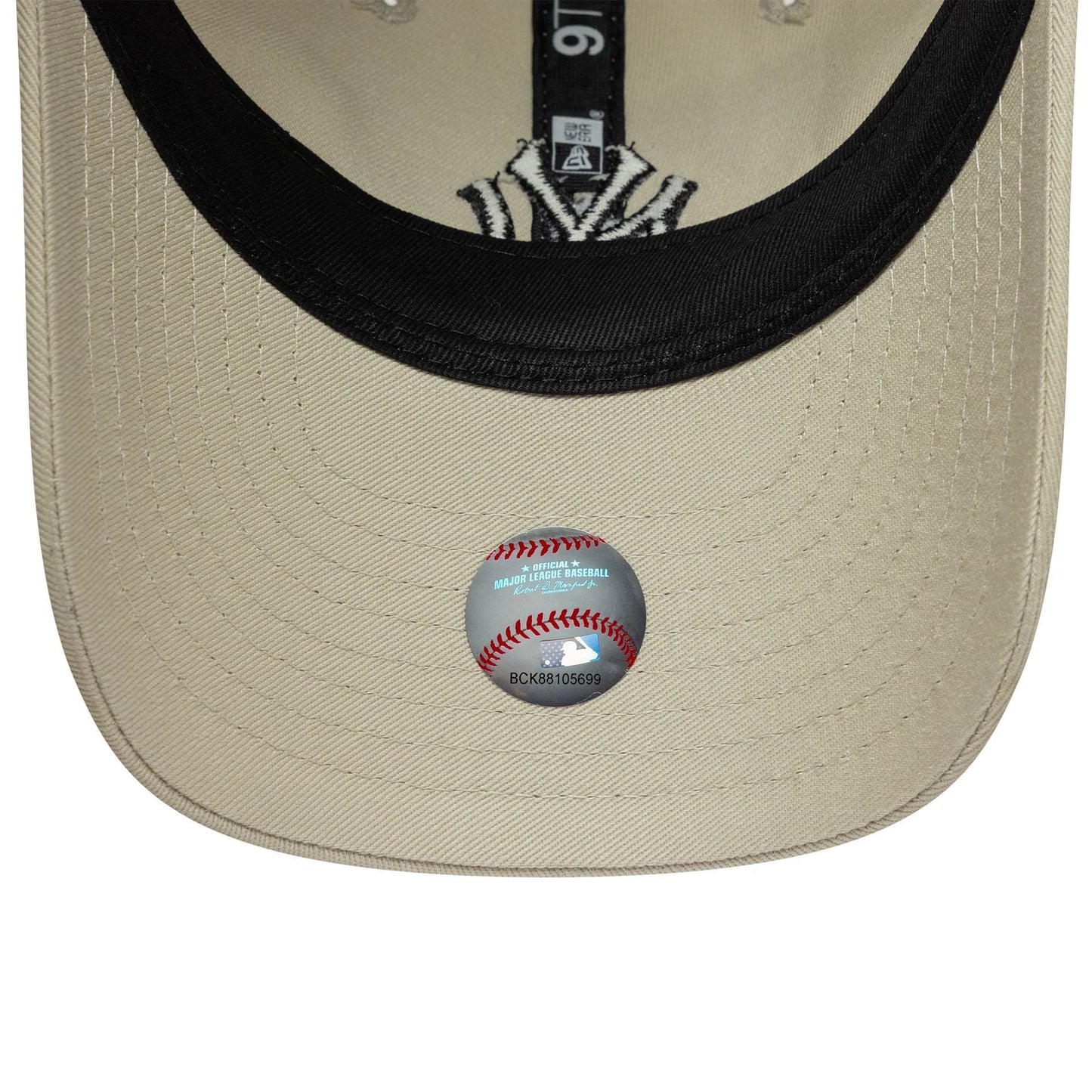 Pictured is this Youth MLB League Essential New York Yankees 9TWENTY in light beige. 5