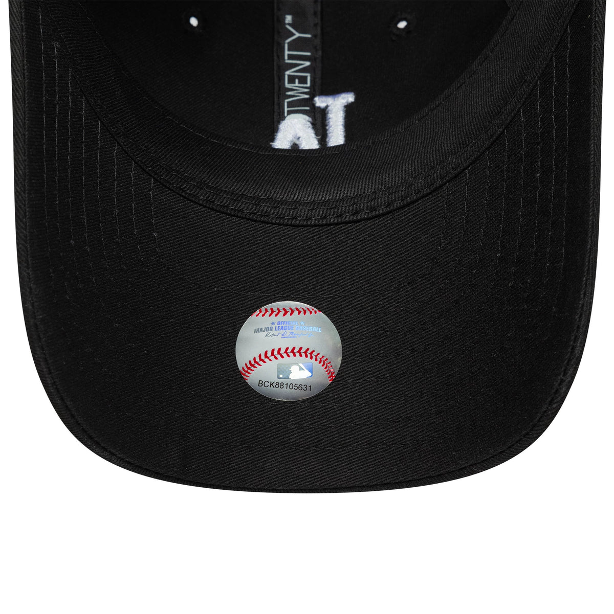 LA Dodgers Youth MLB League Essential Black New Era 9TWENTY Cap, inside view showing black taping with white text, a black sweatband, and an MLB holographic authenticity sticker on the black undervisor.