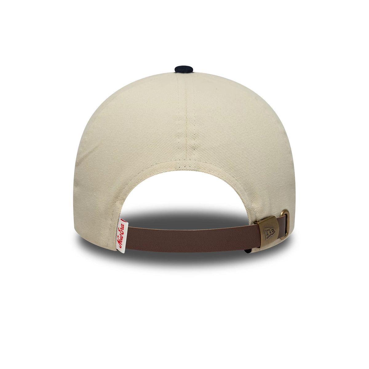 New Era Patch Suede Cream & Navy 9FORTY E-Frame Cap, rear view showing a cream-coloured crown with a brown adjustable strap and a branded brass clasp, complemented by a navy top button.