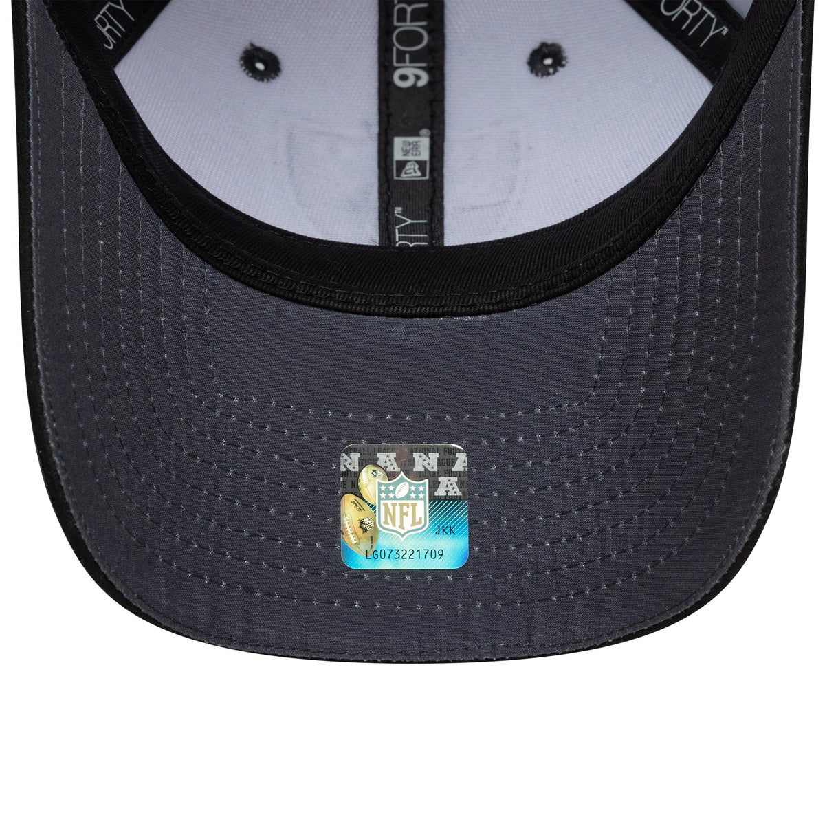 Las Vegas Raiders NFL Microfibre Charcoal New Era 9FORTY Cap, inside view showing black taping with white text, a white sweatband, and a holographic NFL sticker placed on the dark grey undervisor.