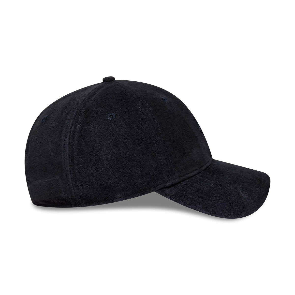 New York Yankees MLB Suede Navy New Era 9TWENTY Cap, side view showing a deep navy suede texture with a soft, unstructured crown, curved visor, and embroidered eyelets, offering a classic sporty look.