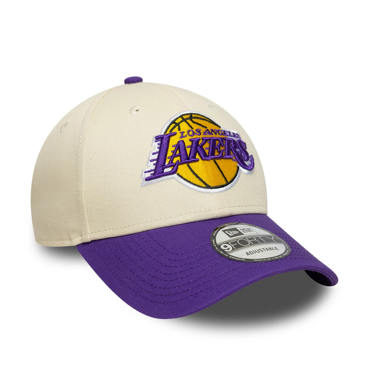 LA Lakers NBA Colour Block Cream New Era 9FORTY Cap, three-quarter view showing the purple and yellow embroidered Lakers logo on the cream front panel, purple curved visor and 9FORTY size sticker on the top.