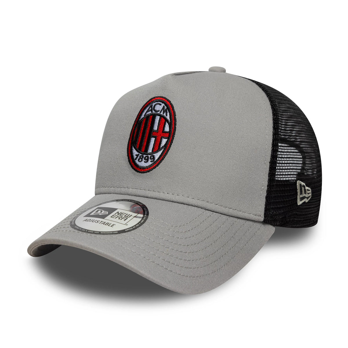 AC Milan Patch Grey New Era 9FORTY A-Frame Trucker Cap, three-quarter view showing the embroidered AC Milan logo on the grey front panel, a curved visor with a 9FORTY size sticker, and a black mesh back with the New Era flag logo on the left side.