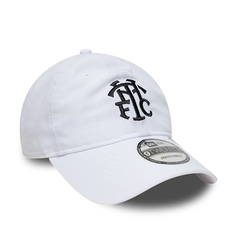 Repreve® Tottenham Hotspur FC White New Era 9TWENTY Adjustable Cap, three-quarter view showing the black embroidered THFC logo on the front panel, curved white visor with a 9TWENTY size sticker, and top button.