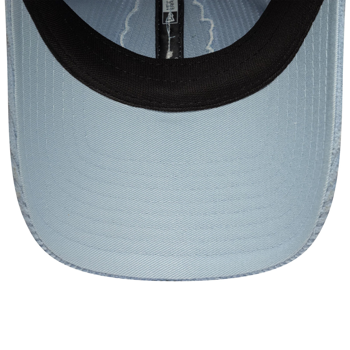 New Era Visa Cash App Racing Bulls Womens Pastel Blue Cord Pony Tail Cap, inside view showing the black sweatband, inner taping with the New Era logo, and light blue undervisor with stitching details.