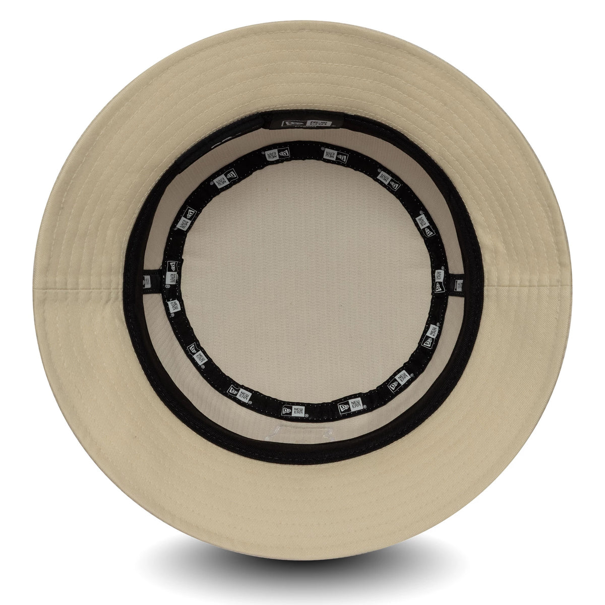 New Era Visa Cash App Racing Bulls Womens Cream Cord Bucket Hat, inside view showing the black taping with white New Era logos around the band and the cream fabric of the crown and visor.