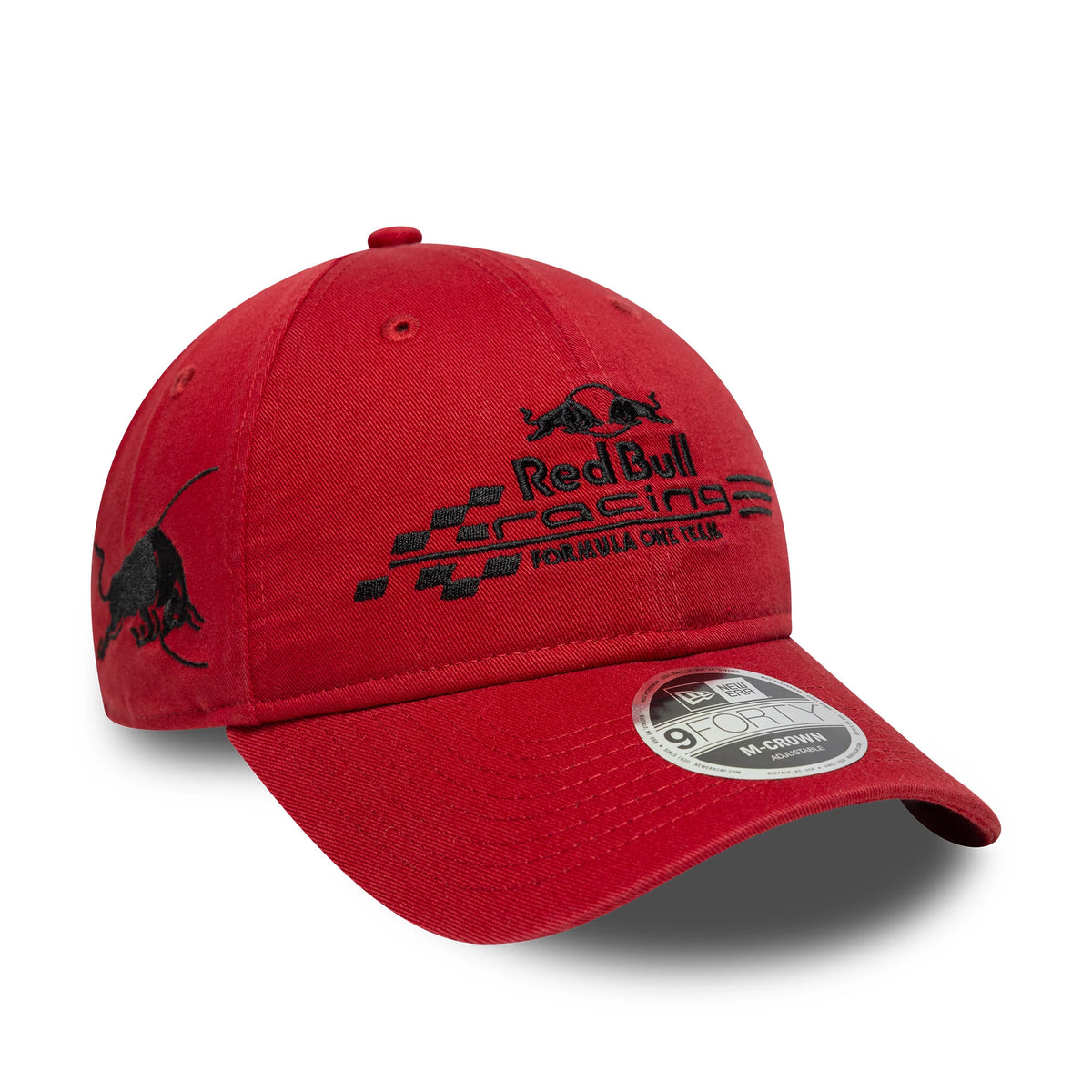 Red Bull Racing Washed Dark Red New Era 9FORTY M-Crown Cap, three-quarter view showing the black embroidered Red Bull Racing Formula One logo on the front panel, a black bull silhouette on the side and a 9FORTY size sticker on the curved visor.