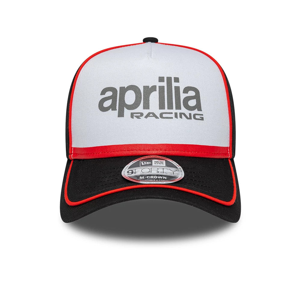 Aprilia Reflective Black New Era 9FORTY M-Crown A-Frame Cap, front view showing the aprilia racing text logo in grey on the white crown, with a curved black visor edged in red and a 9FORTY size sticker.