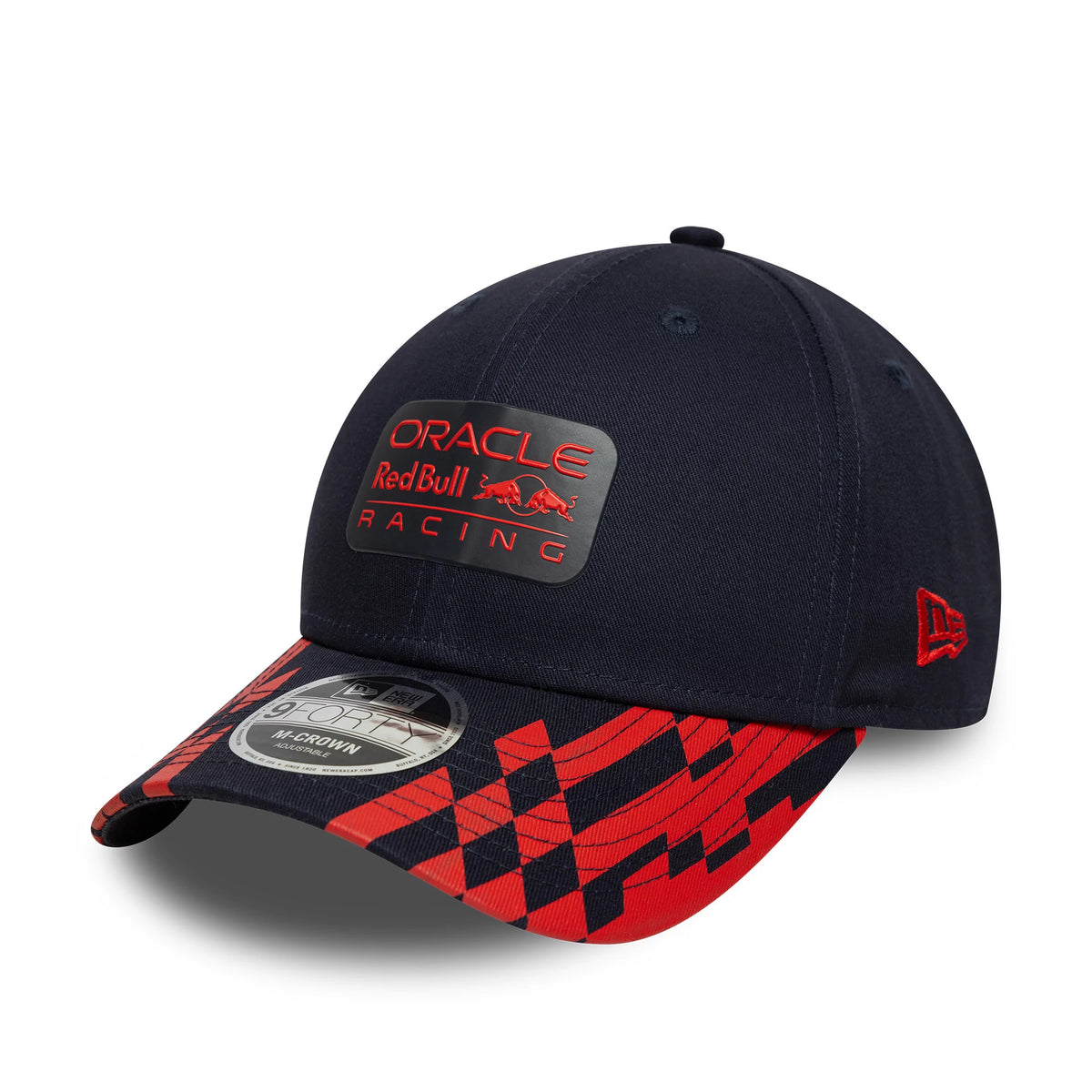 Red Bull Racing Visor Print Dark Blue New Era 9FORTY M-Crown Cap, three-quarter view showing the raised red embroidered Oracle Red Bull Racing patch on the front panel, red New Era flag logo on the left side, and patterned red.