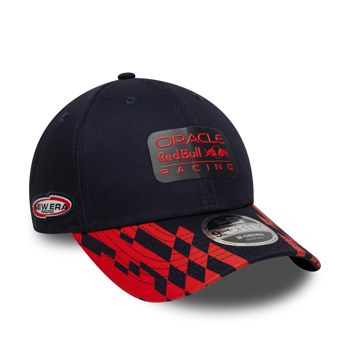 Red Bull Racing Visor Print Dark Blue New Era 9FORTY M-Crown Cap, three-quarter view showing the raised Oracle Red Bull Racing logo in red and black embroidery on the front panel, with a matching geometric red pattern on the visor.