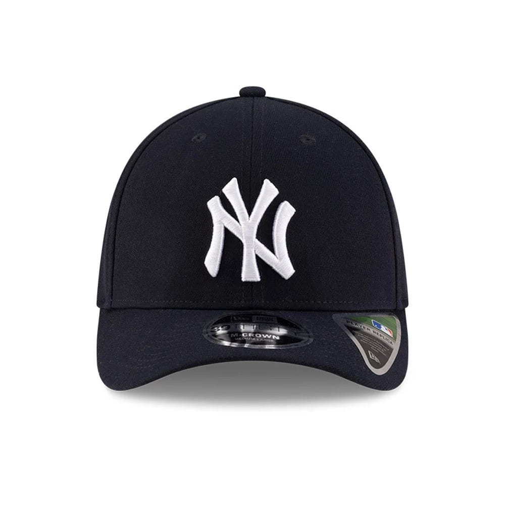 Yankees MLB Player Replica Navy New Era 39THIRTY M-Crown Stretch Fit Cap, front view showing the white raised embroidered NY logo on the structured navy crown with a curved visor and 39THIRTY size sticker underneath.