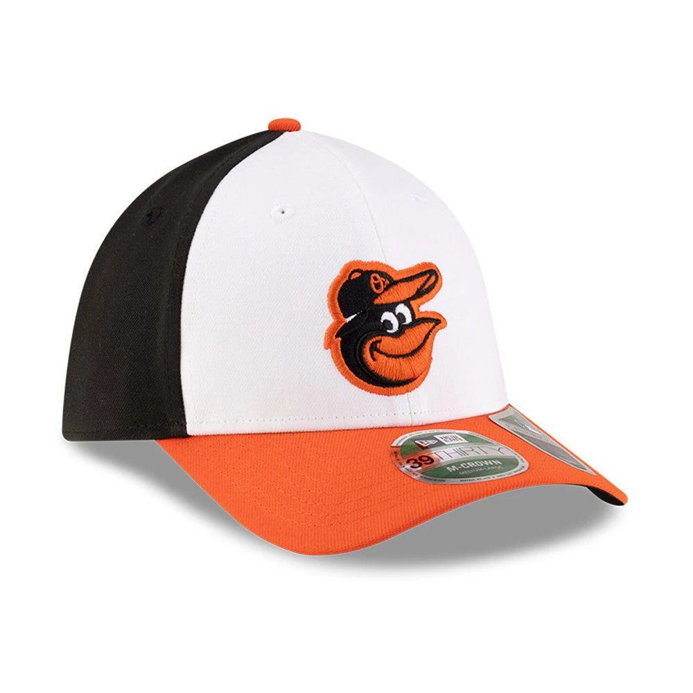 Orioles MLB Player Replica Black New Era 39THIRTY M-Crown Stretch Fit Cap, three-quarter view showing the raised embroidered Oriole logo on the front white panel, with a contrasting orange visor and 39THIRTY size sticker.