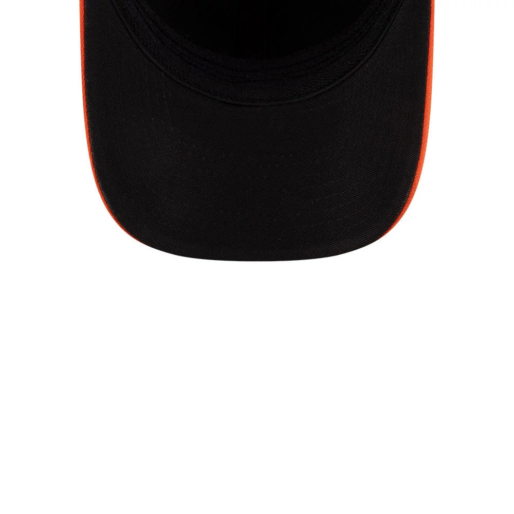 Orioles MLB Player Replica Black New Era 39THIRTY M-Crown Stretch Fit Cap, close-up showing the black curved visor with a clean finish and bright orange edging, highlighting the design.