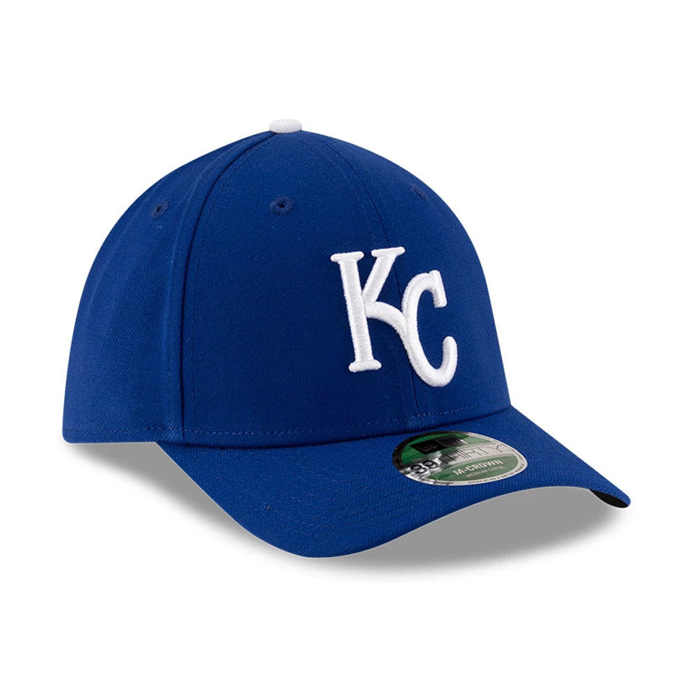 Royals MLB Player Replica Blue New Era 39THIRTY M-Crown Stretch-Fit Cap, three-quarter view showing the raised white KC logo on the front panel, with a curved blue visor and a 39THIRTY size sticker.