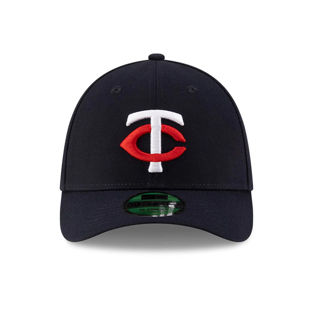 Twins MLB Player Replica Navy New Era 39THIRTY M-Crown Stretch Fit Cap, front view showing the raised white and red embroidered Twins logo on the structured navy crown, with a curved visor and a 39THIRTY size sticker.