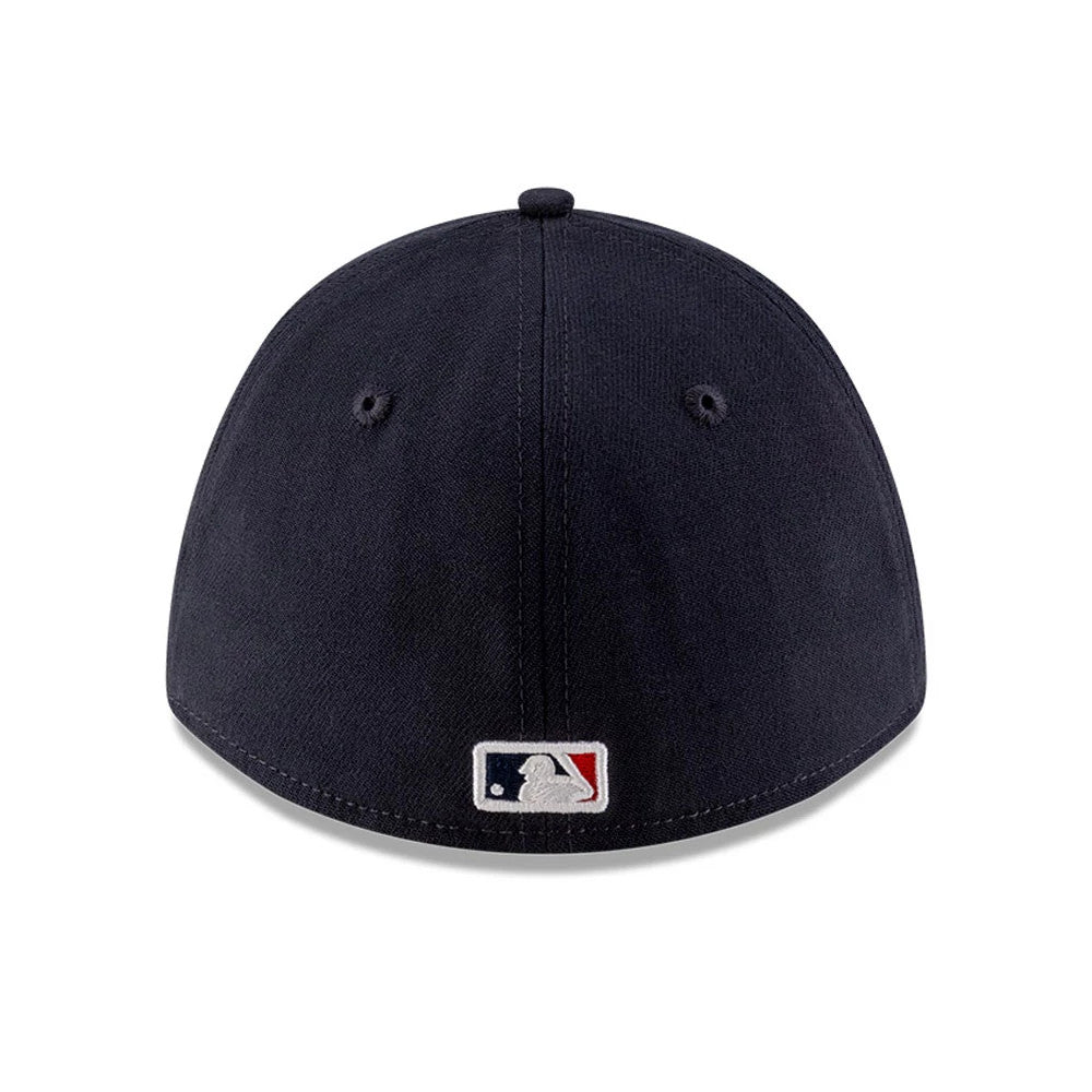 Twins MLB Player Replica Navy New Era 39THIRTY M-Crown Stretch Fit Cap, rear view showing the embroidered MLB Batterman logo in red, white, and blue at the centre of the back panels on the navy structured crown.