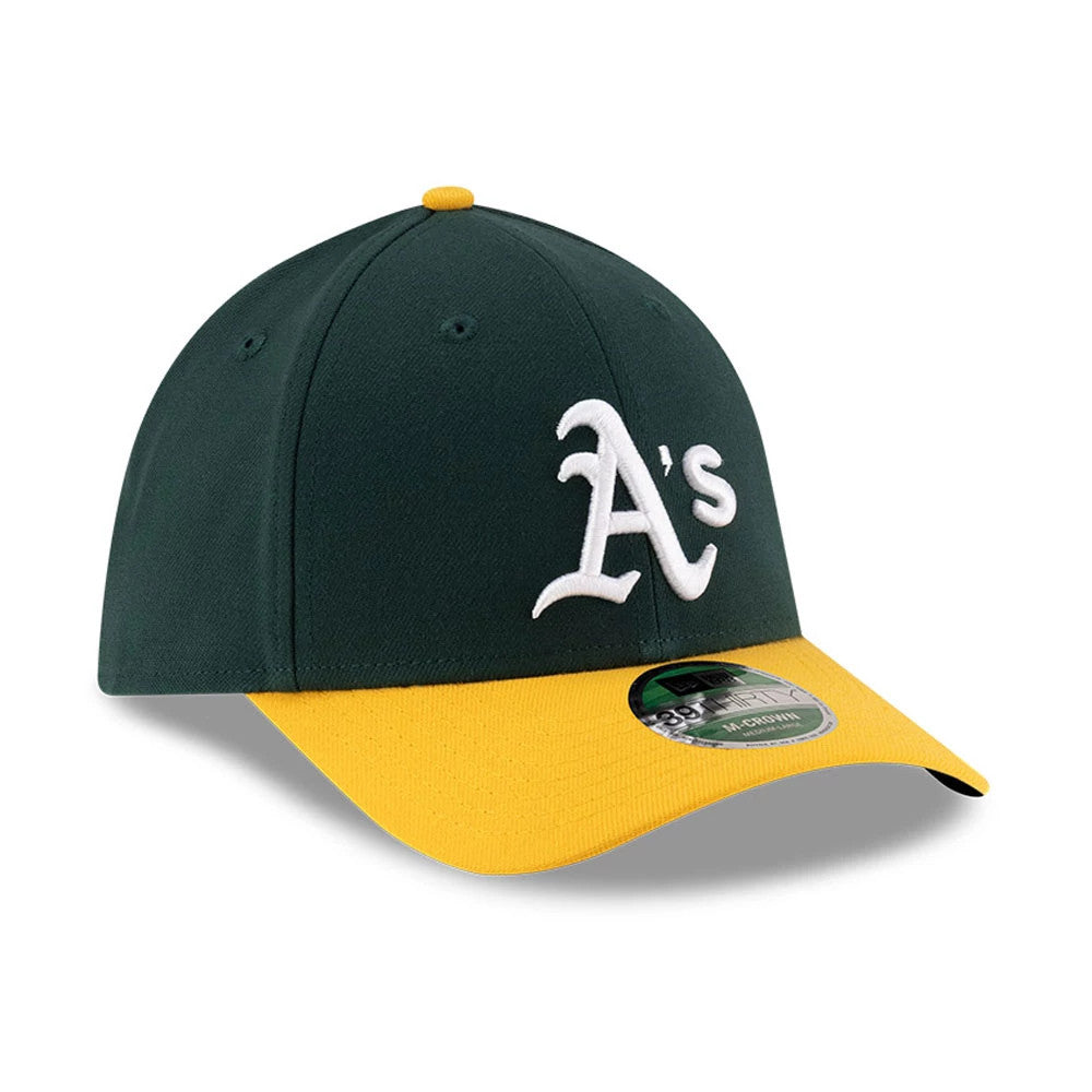 Athletics MLB Player Replica Dark Green New Era 39THIRTY M-Crown Stretch Fit Cap, three-quarter view showing the white embroidered A’s logo on the front panel, a curved yellow visor, and a 39THIRTY size sticker on the visor.