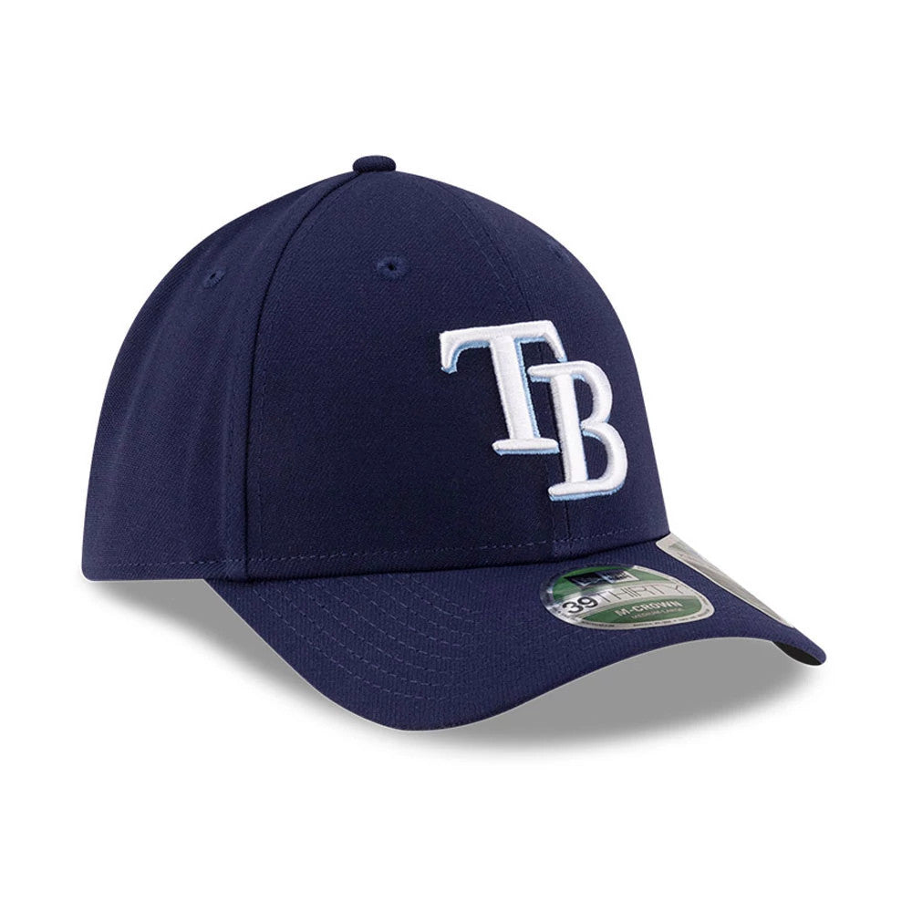 Tampa Bay Rays MLB Player Replica Navy New Era 39THIRTY M-Crown Stretch Fit Cap, three-quarter view showing a raised white TB logo on the front panel, curved visor with a 39THIRTY size sticker, and a navy top button.