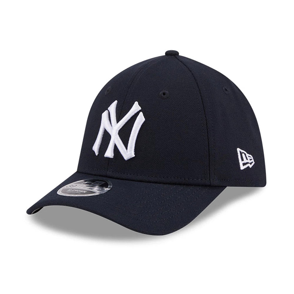 New York Yankees MLB Navy New Era 39THIRTY M-Crown Stretch Fit Cap, three-quarter view showing the raised white NY logo on the front panel, curved navy visor with 39THIRTY size sticker, and white New Era flag logo on the left side.