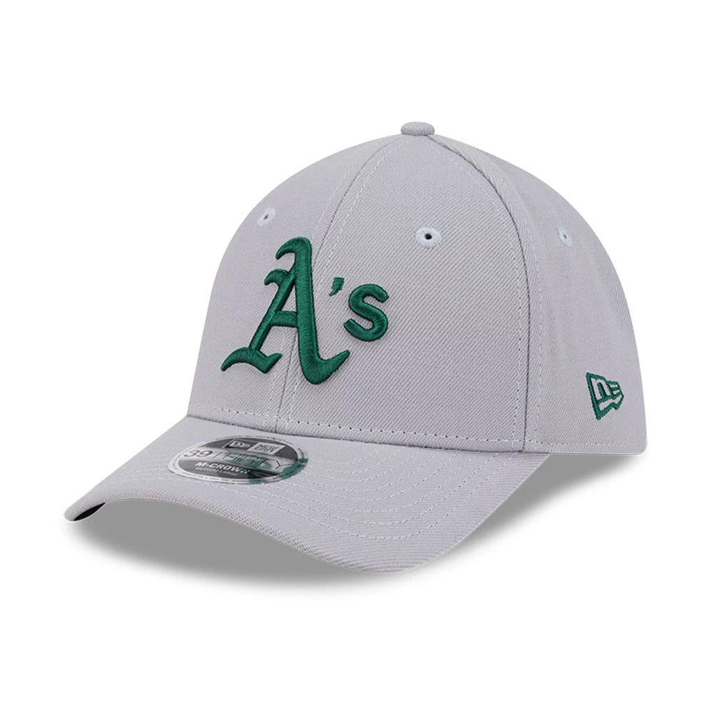 Athletics MLB Grey New Era 39THIRTY M-Crown Stretch Fit Cap, three-quarter view showing the raised green A's logo in front, curved grey visor with 39THIRTY size sticker, and New Era flag logo on the left side.