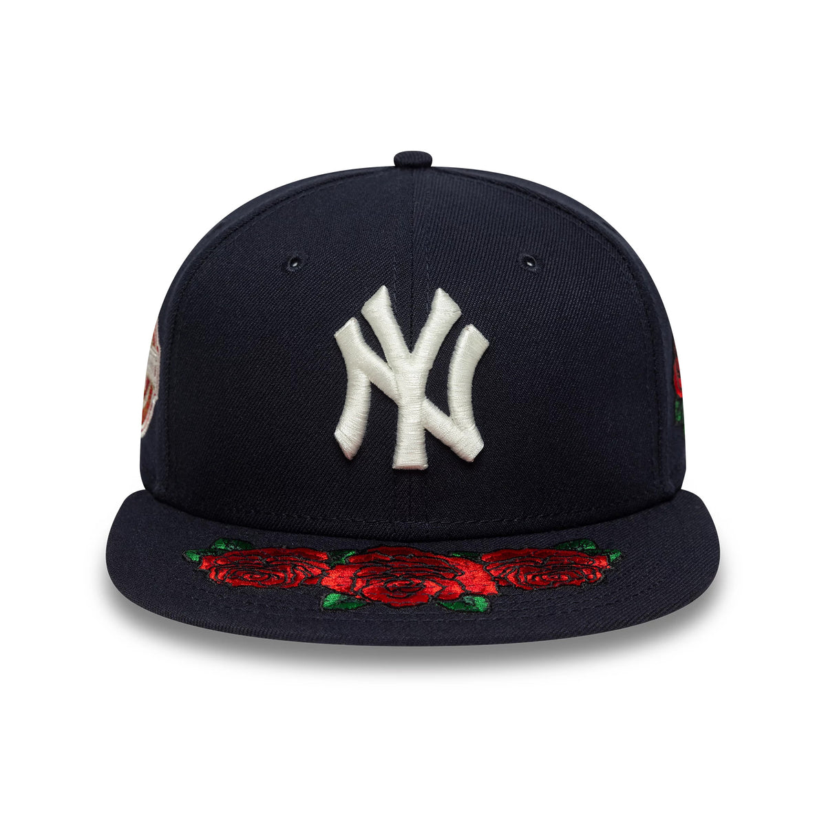 New York Yankees MLB Cooperstown Floral Navy New Era 59FIFTY Fitted Cap, front view showing white raised embroidered NY logo on the navy front panel and vivid red floral embroidery on the flat navy visor.