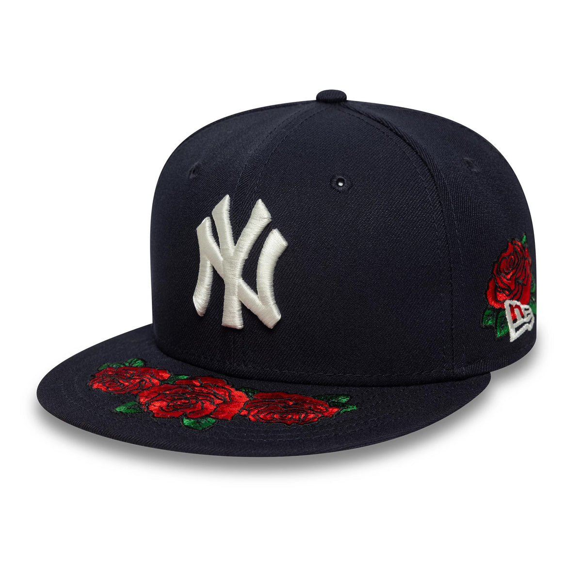 New York Yankees MLB Cooperstown Floral Navy New Era 59FIFTY Fitted Cap, three-quarter view showing the white raised Yankees logo on the front panel, red embroidered roses on the navy visor, and the New Era flag logo in white on the left side.