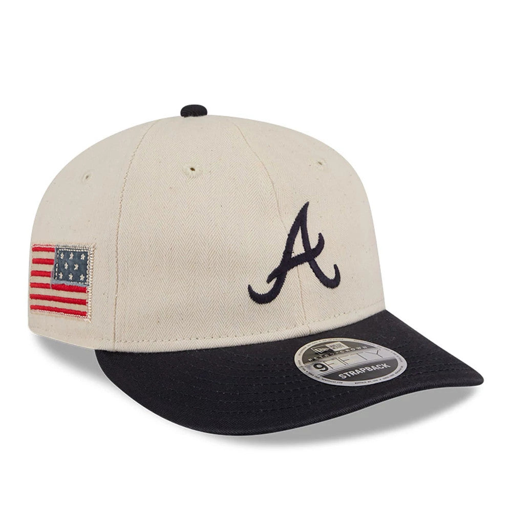 Atlanta Braves MLB Americana Herringbone White Retro Crown New Era 9FIFTY Adjustable Cap, three-quarter view showing a navy embroidered A logo on the front panel, an American flag on the left side, and a navy flat visor with a 9FIFTY size sticker.