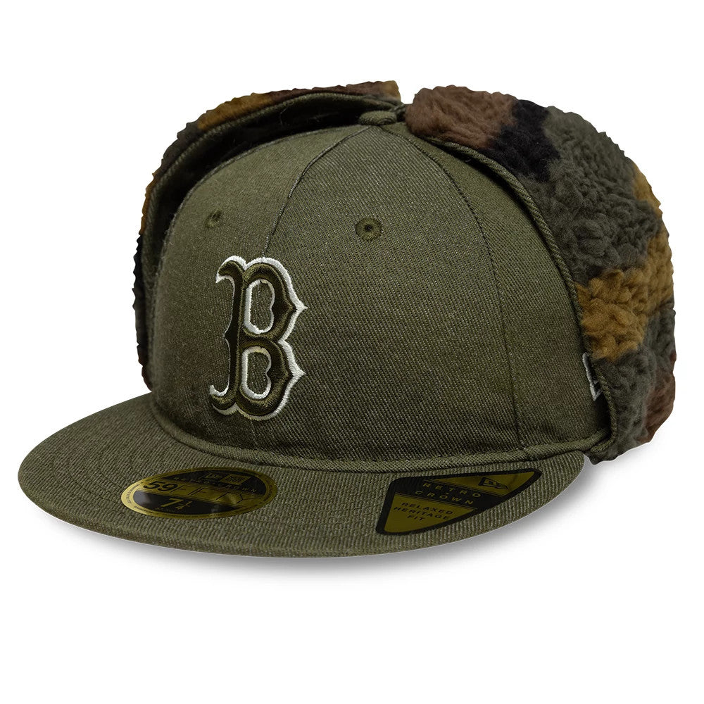 Boston Red Sox MLB Camo Open Green Retro Crown Dogear New Era 59FIFTY Fitted Cap, three-quarter view showing the raised white embroidered B logo on the green crown, camo-patterned dogear flaps, and gold 59FIFTY size sticker on the visor.