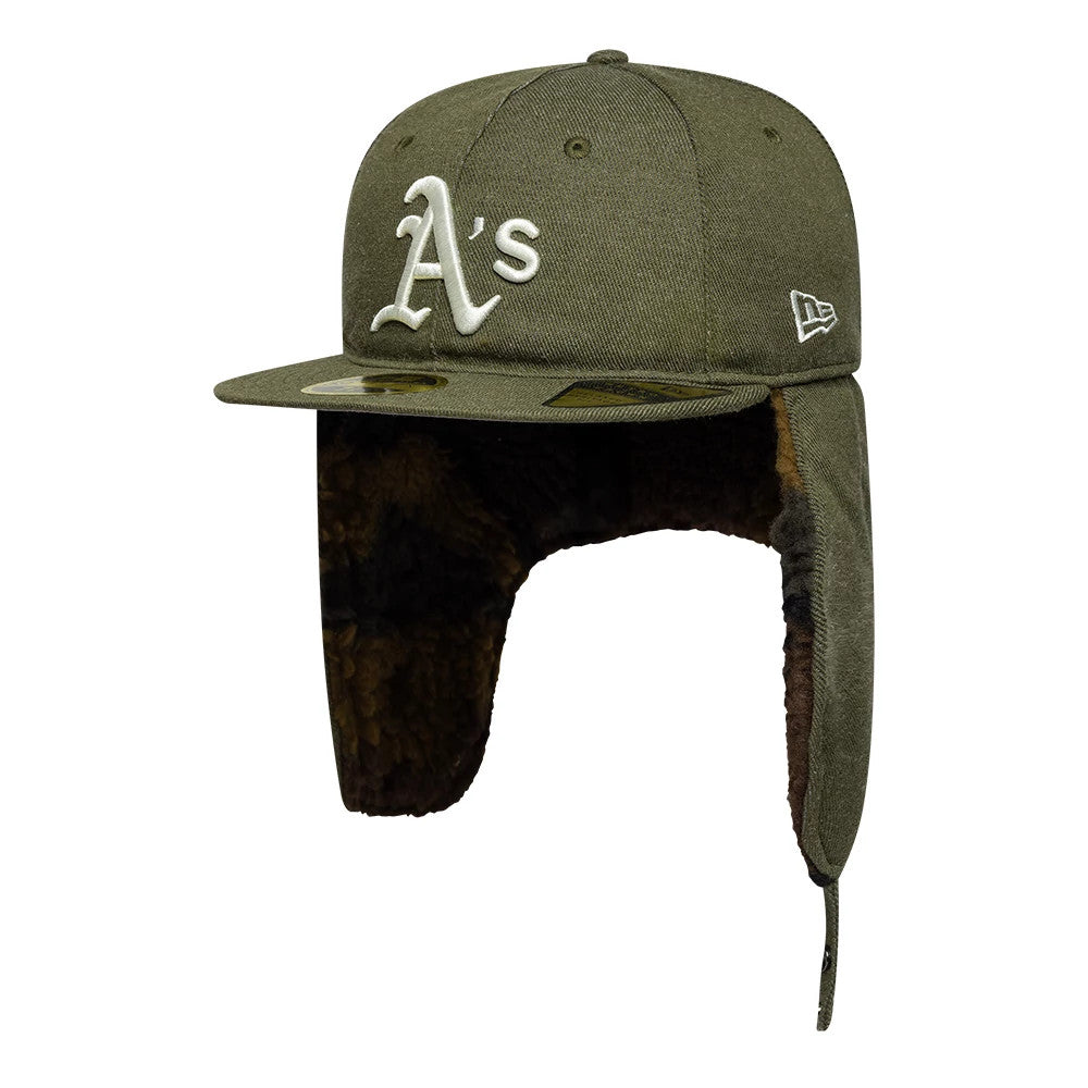 Athletics MLB Camo Open Green Retro Crown Dogear New Era 59FIFTY Fitted Cap, three-quarter view showing the raised white embroidered A's logo on the front panel, flat green visor with a gold 59FIFTY size sticker, and plush brown ear flaps.