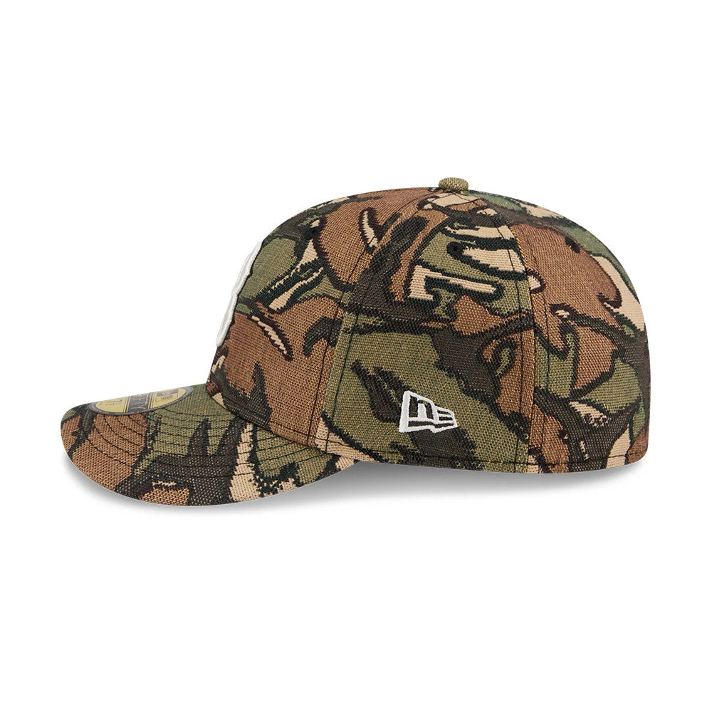 Boston Red Sox MLB Jacquard Camo New Era 59FIFTY Fitted Cap, side view showing the white New Era flag logo on a structured crown with a green and brown camo pattern, curved visor and 59FIFTY size sticker.