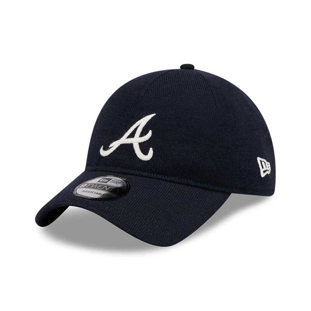 Atlanta Braves MLB Merino Wool Navy New Era 9TWENTY Adjustable Cap, three-quarter view showing the white embroidered Braves A logo on the front panel, with a curved navy visor and a 9TWENTY size sticker.