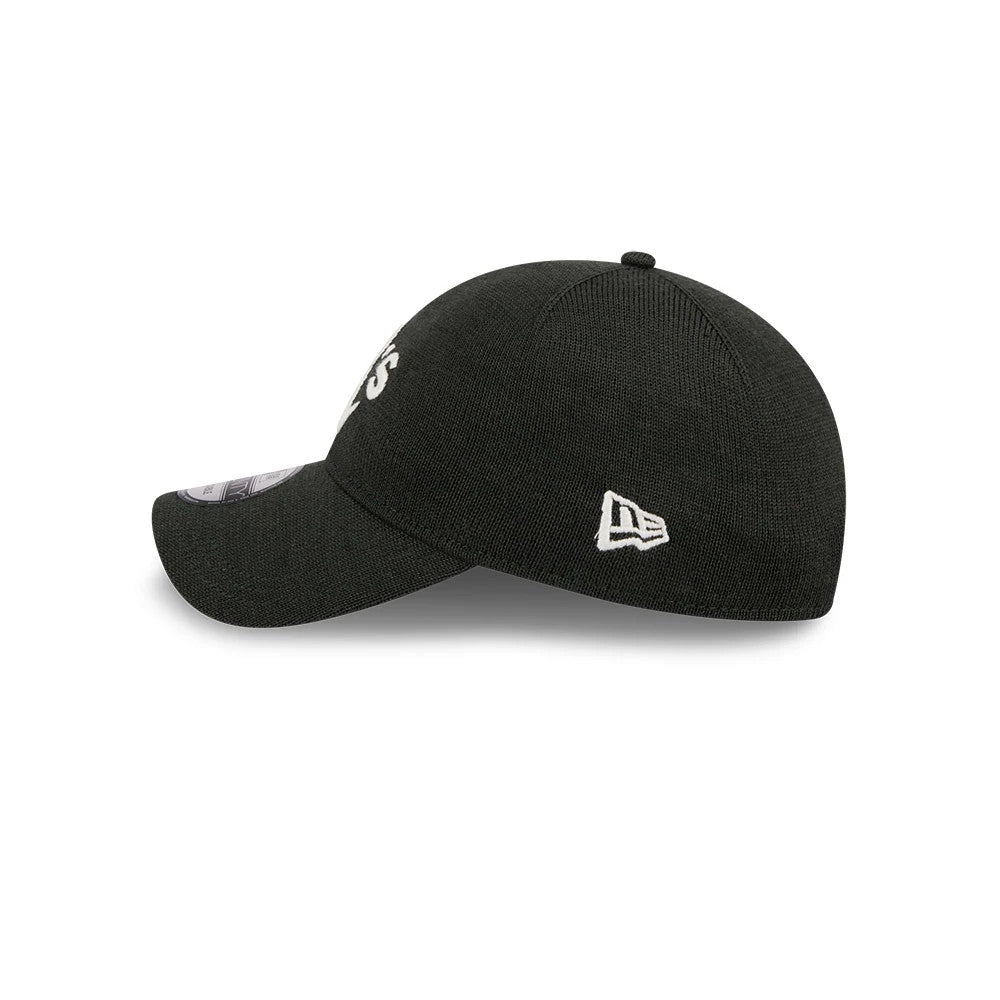 Athletics MLB Merino Wool Dark Green New Era 9TWENTY Adjustable Cap, side view showing the white embroidered New Era flag logo on the left side of the dark green crown with a curved visor.