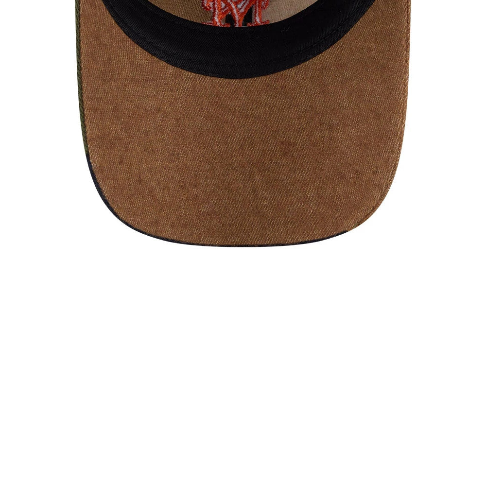 New York Mets MLB Patchwork Open Brown New Era 9TWENTY Adjustable Cap, inside view showing the brown undervisor with black edge trim and the underside of the embroidered Mets logo appearing through the front fabric.