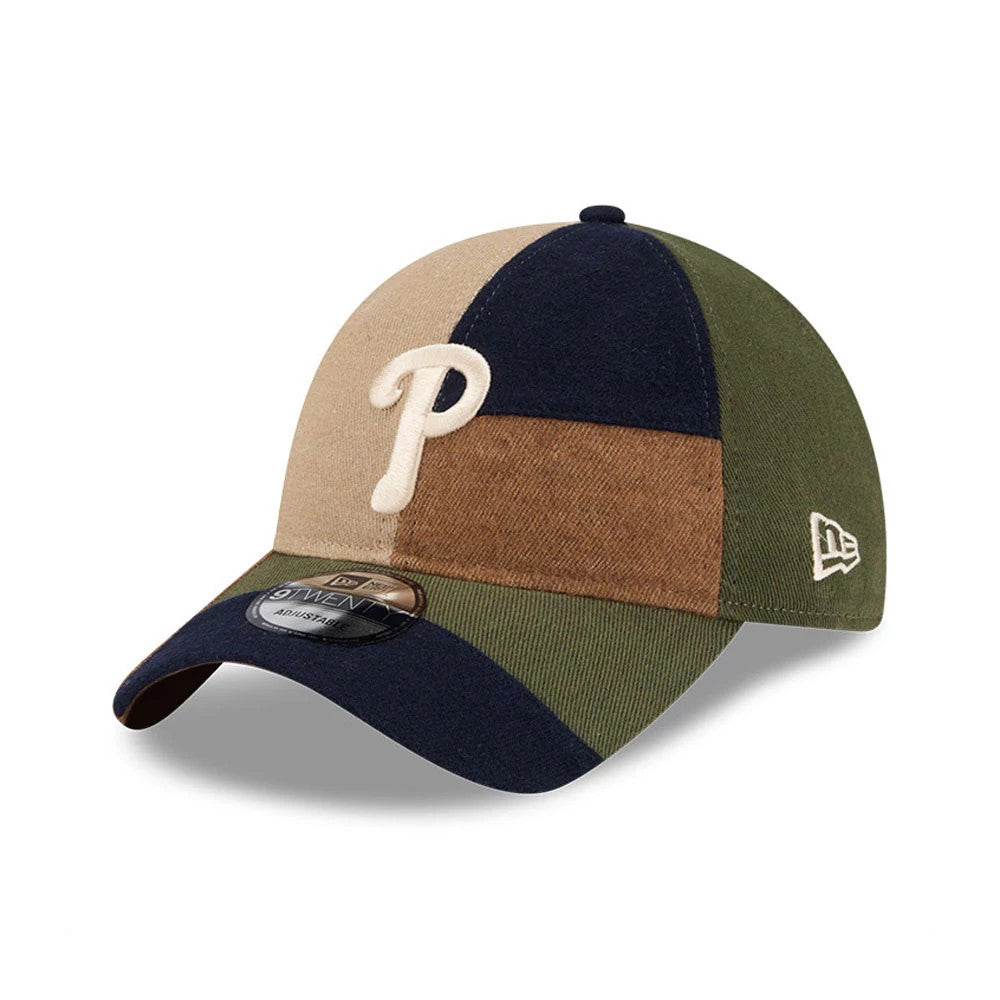 Philadelphia Phillies MLB Patchwork Open Brown New Era 9TWENTY Adjustable Cap, three-quarter view showing a cream embroidered P logo on the front panels, a dark visor with a 9TWENTY size sticker, and a white New Era flag logo on the left side.