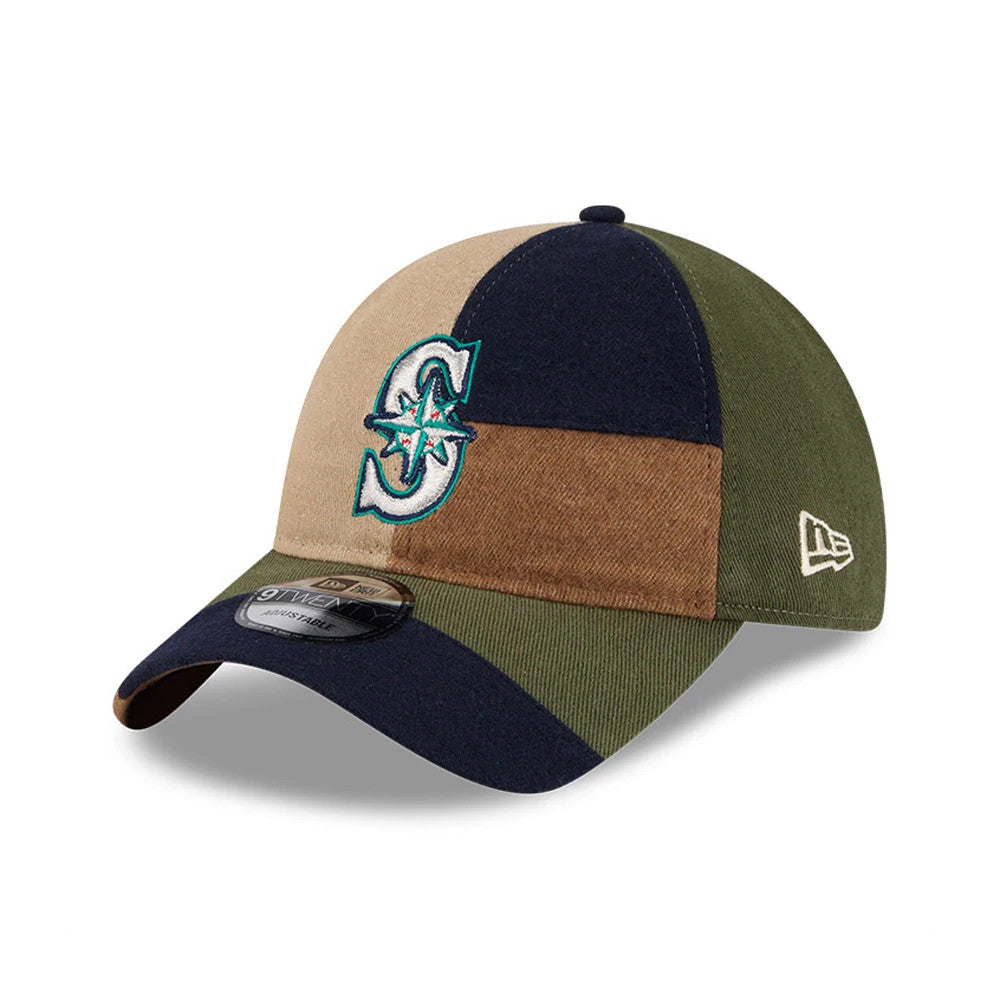 Seattle Mariners MLB Patchwork Open Brown New Era 9TWENTY Adjustable Cap, three-quarter view showing a turquoise and white embroidered front logo, multicoloured patchwork panels, a bent visor with a 9TWENTY size sticker.