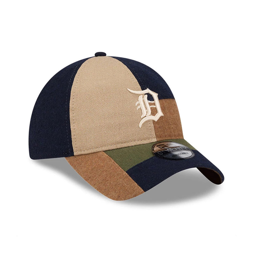 Detroit Tigers MLB Patchwork Open Brown New Era 9TWENTY Adjustable Cap, three-quarter view showing the white embroidered D logo on the beige front panel, with contrasting patchwork panels and a 9TWENTY size sticker on the curved visor.