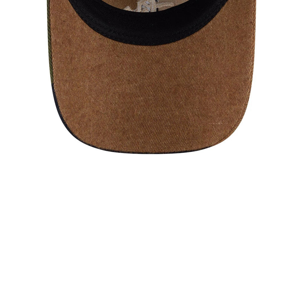Chicago White Sox MLB Patchwork Open Brown New Era 9TWENTY Adjustable Cap, inside view showing black sweatband lining the interior of the brown visor and tan taping along the seams, with a graphic print on the fabric.