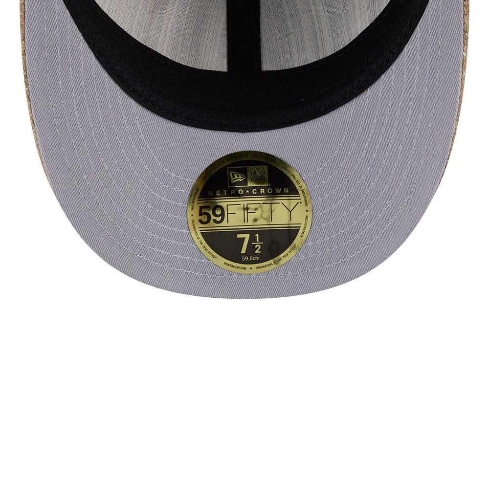 Atlanta Braves MLB Vintage Tweed Open Blue Retro Crown New Era 59FIFTY Fitted Cap, inside view showing the black sweatband with grey taping and a gold 59FIFTY size sticker on the grey undervisor.