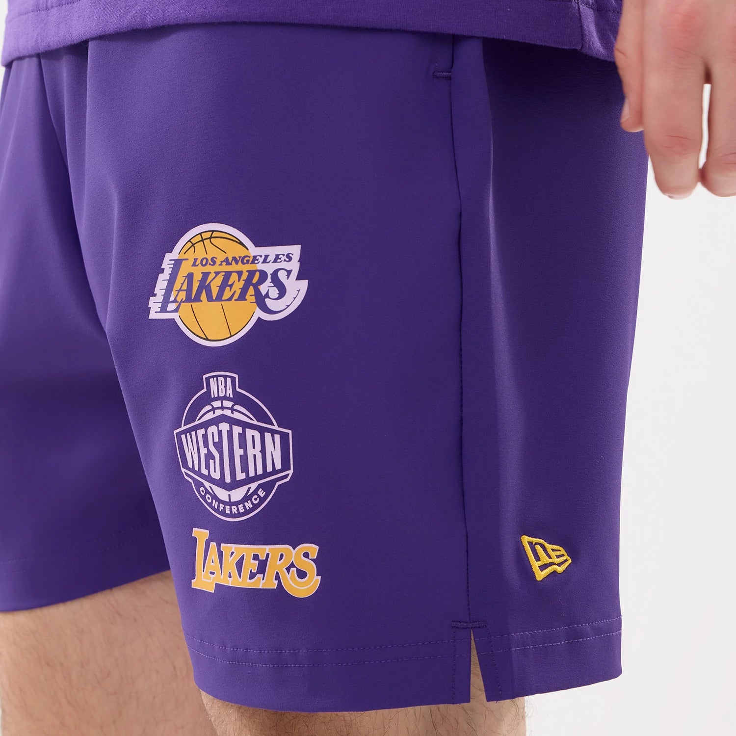 The model is wearing this NBA Match LA Lakers Oversized Shorts in purple. 3