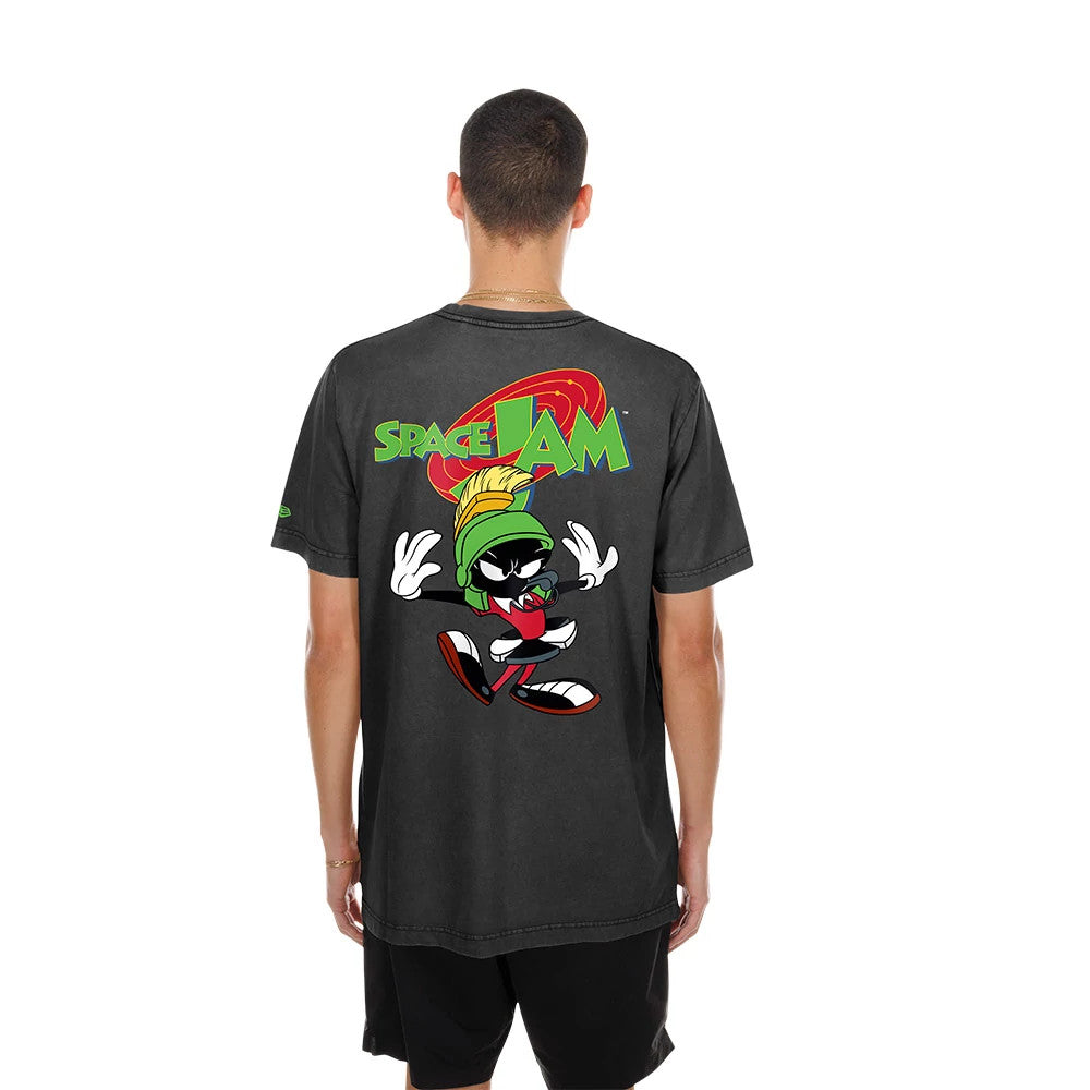 New Era Space Jam Warner Brothers Space Jam Black T-Shirt, back view on a model showing a large colourful graphic of Marvin the Martian beneath Space Jam lettering, with a small embroidered New Era logo on the sleeve.