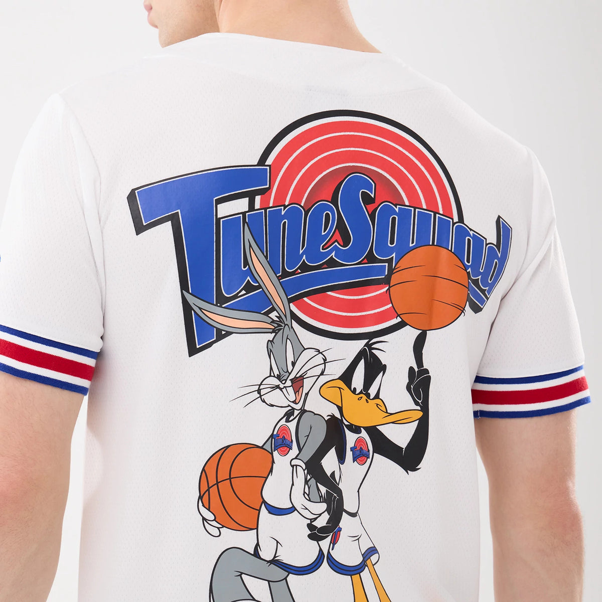 The model is wearing this Warner Brothers Space Jam Mesh Jersey in white. 7