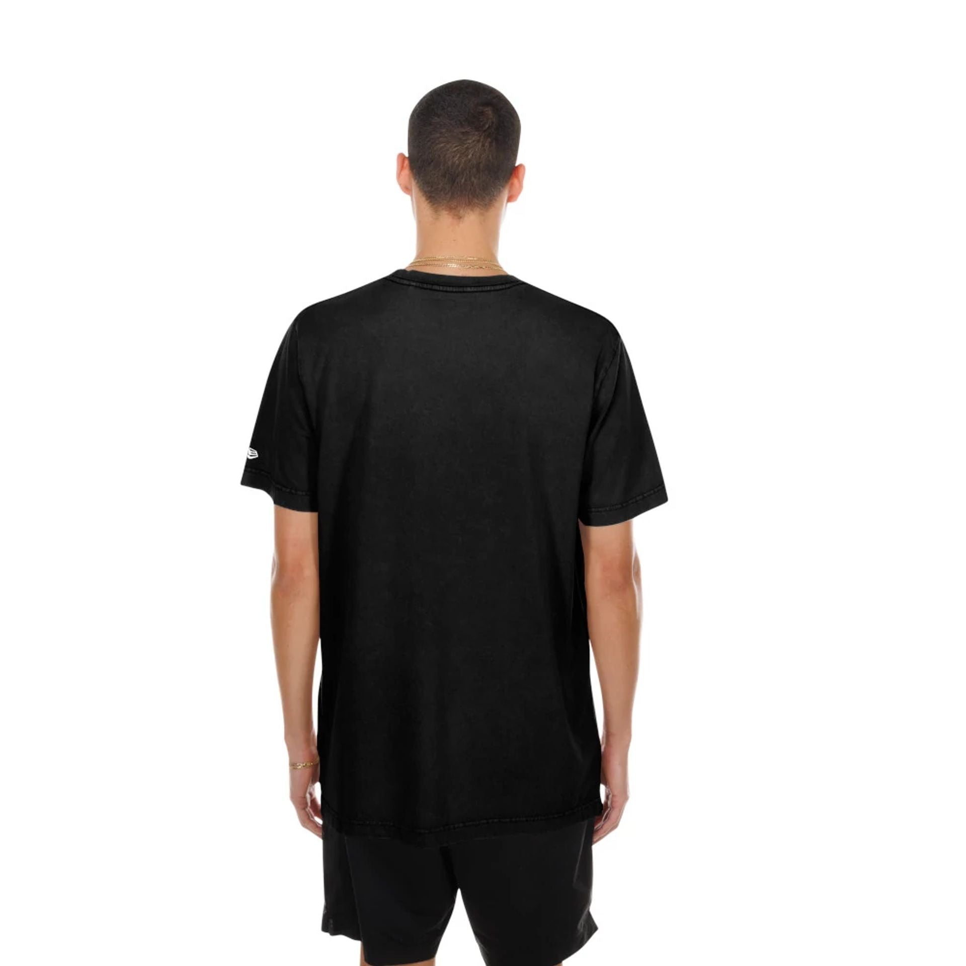 The model is wearing this MLB Script Graphic New York Yankees T-Shirt in black. 2