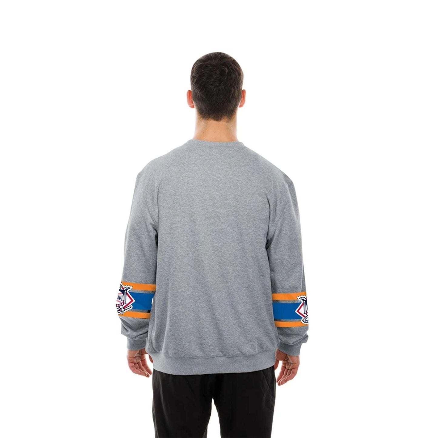 The model is wearing this MLB Sport Classic New York Mets Crew Neck Sweater in grey. 2