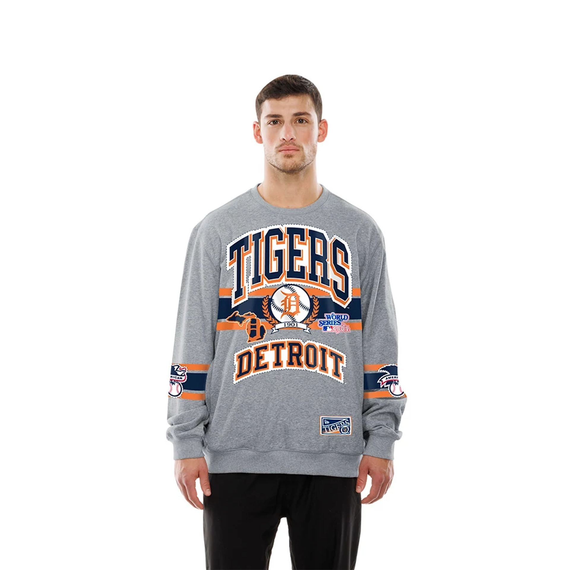 The model is wearing this MLB Sport Classic Detroit Tigers Crew Neck Sweater in grey. 1